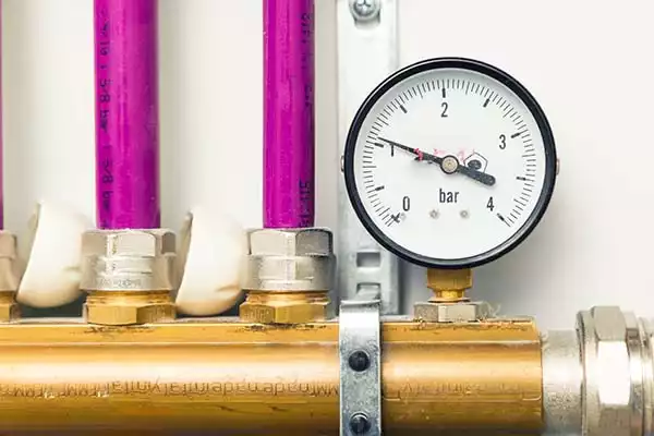 How do I lower the boiler pressure?